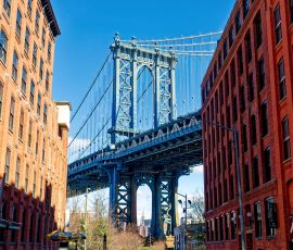 A classic, iconic shot of the Manhattan Bridge from DUMBO with the Empire State Building in the background.